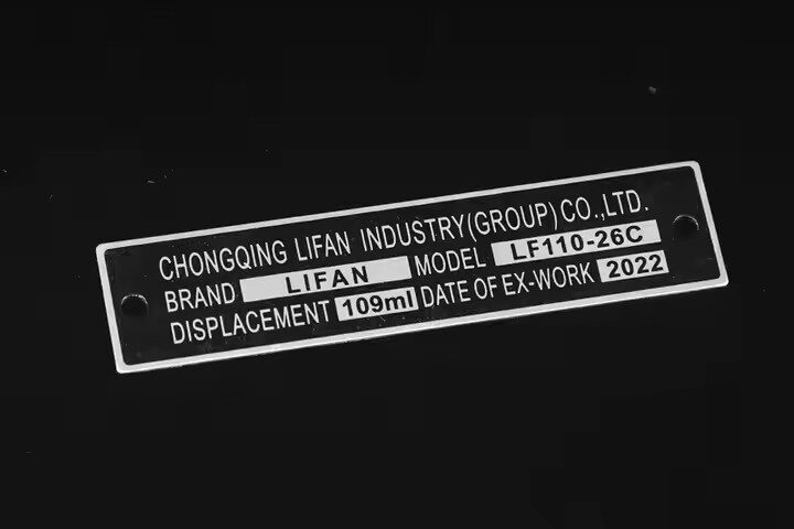 Etched stainless steel nameplate for machinery identification