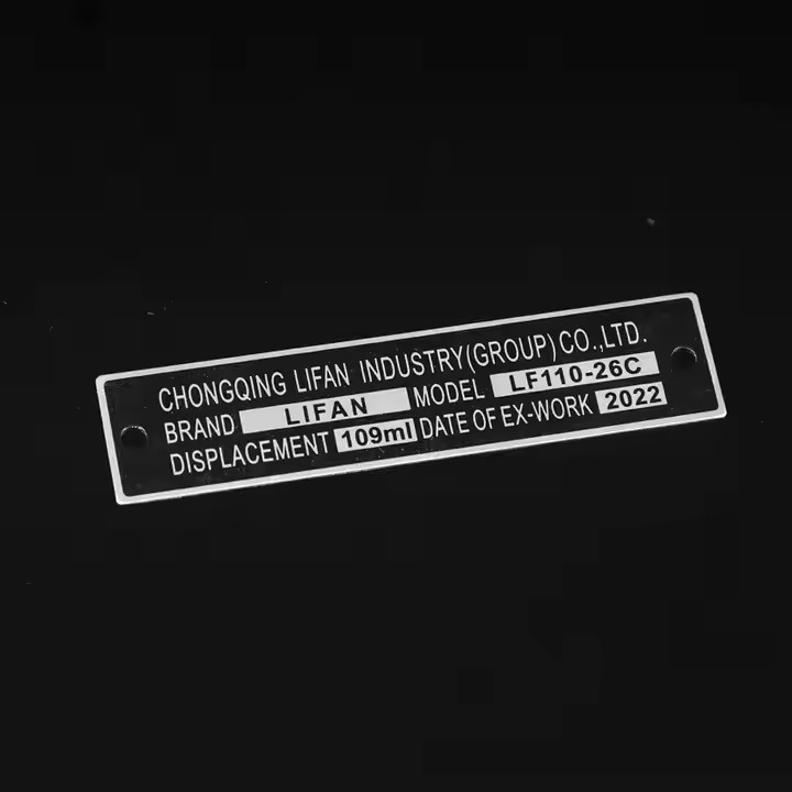 Etched stainless steel nameplate for machinery identification