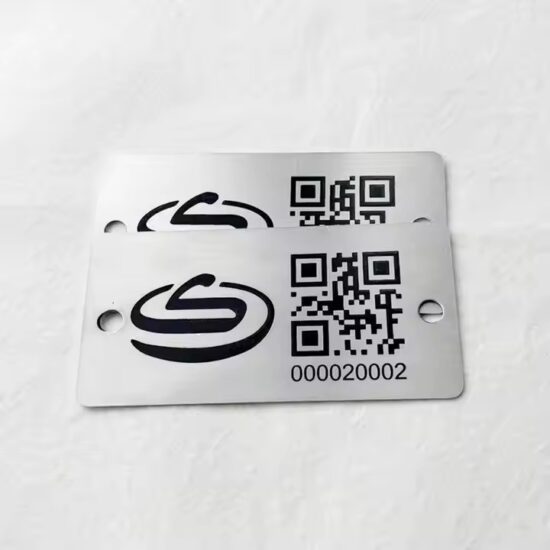 Custom black metal tag with laser-engraved QR code