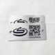 Custom black metal tag with laser-engraved QR code