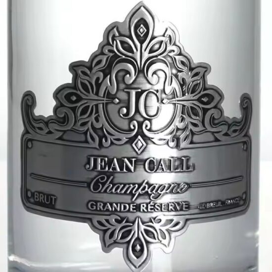 Embossed curved metal wine label with custom logo