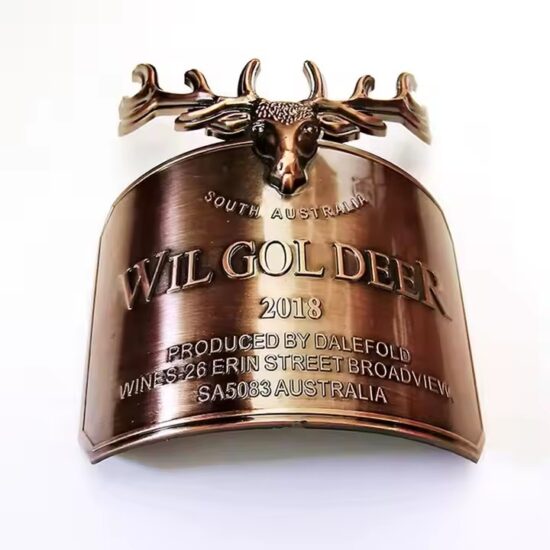 Embossed curved metal wine label with custom logo