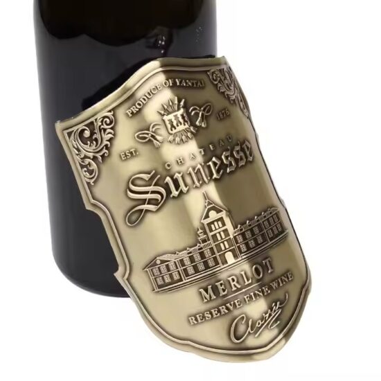 Custom embossed aluminum wine label with adhesive backing