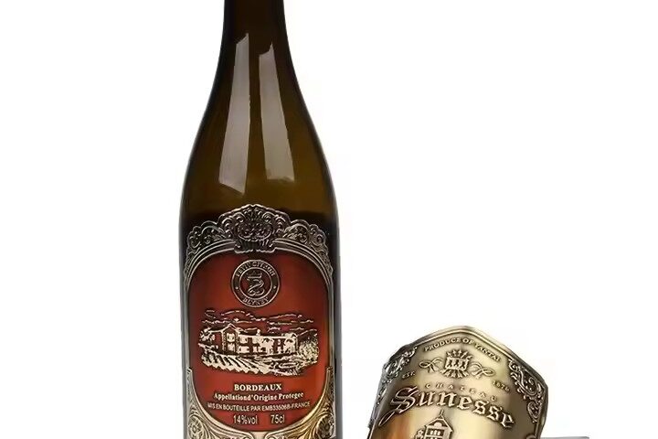 Custom embossed aluminum wine label with adhesive backing